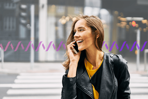 Directory Assistance A smiling woman using a mobile phone