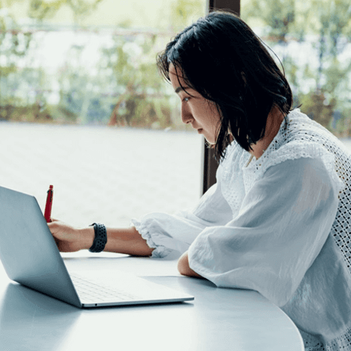 Video helps distant learning Woman studying on laptop